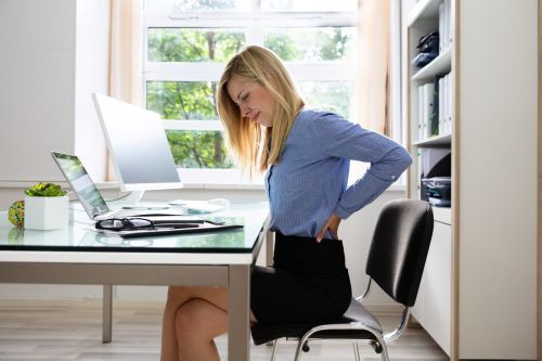 Click Here To Enlarge This Photo Of SITTING WITH BACK PAIN